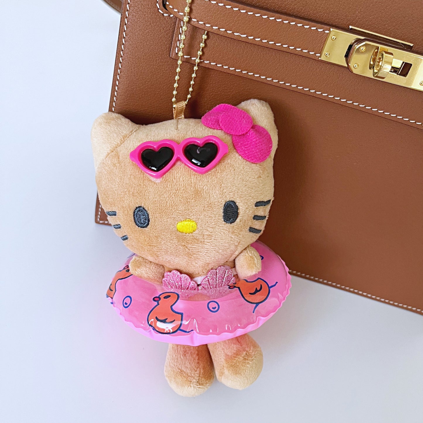 Tanned Hello Kitty tube keyring